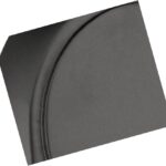 A close-up of a black, smooth, curved surface with a subtle groove, displayed at an angle against a white background.